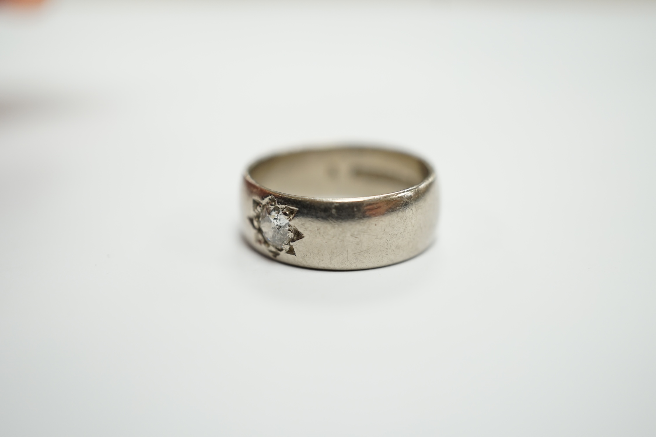 An 18ct white gold and gypsy set solitaire diamond ring, size G, gross weight 5.4 grams.